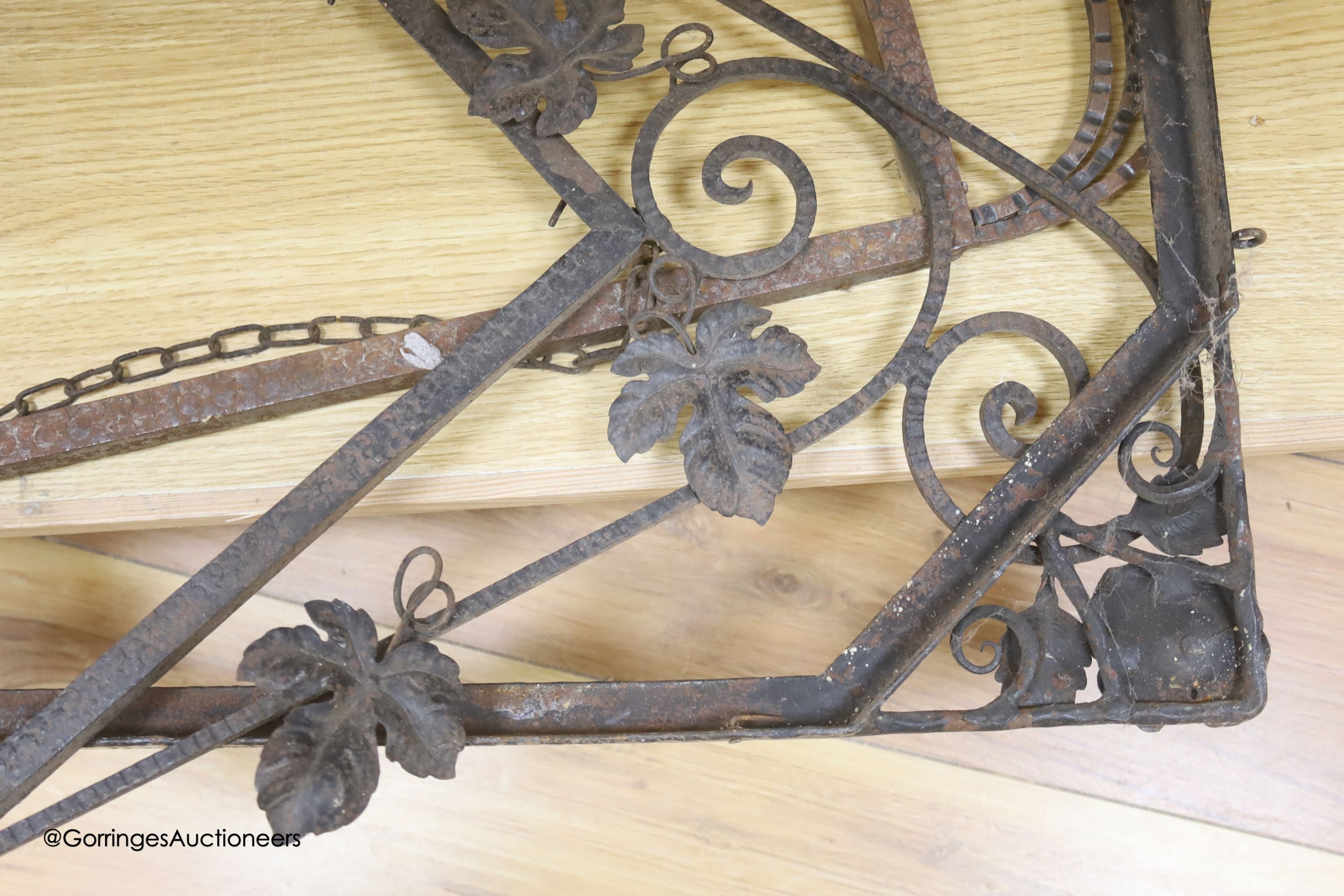 Three wrought iron metal frames, largest 80 x 56cm